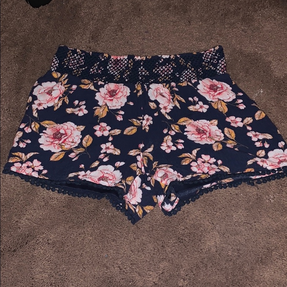 Shorts that are flowey with flowers on them